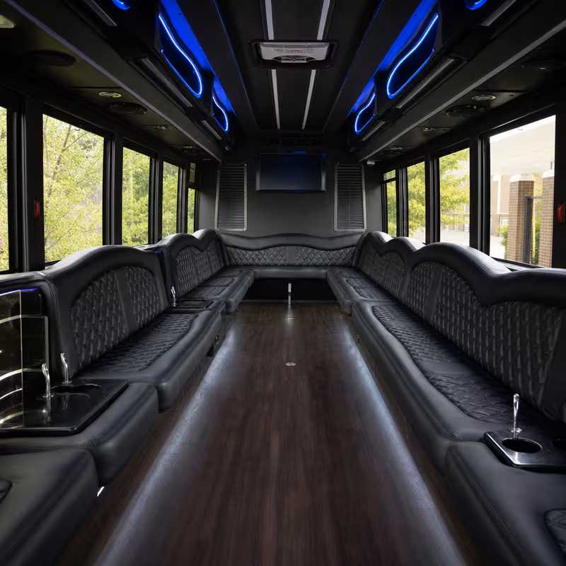 Friends laughing during a Peoria party bus celebration