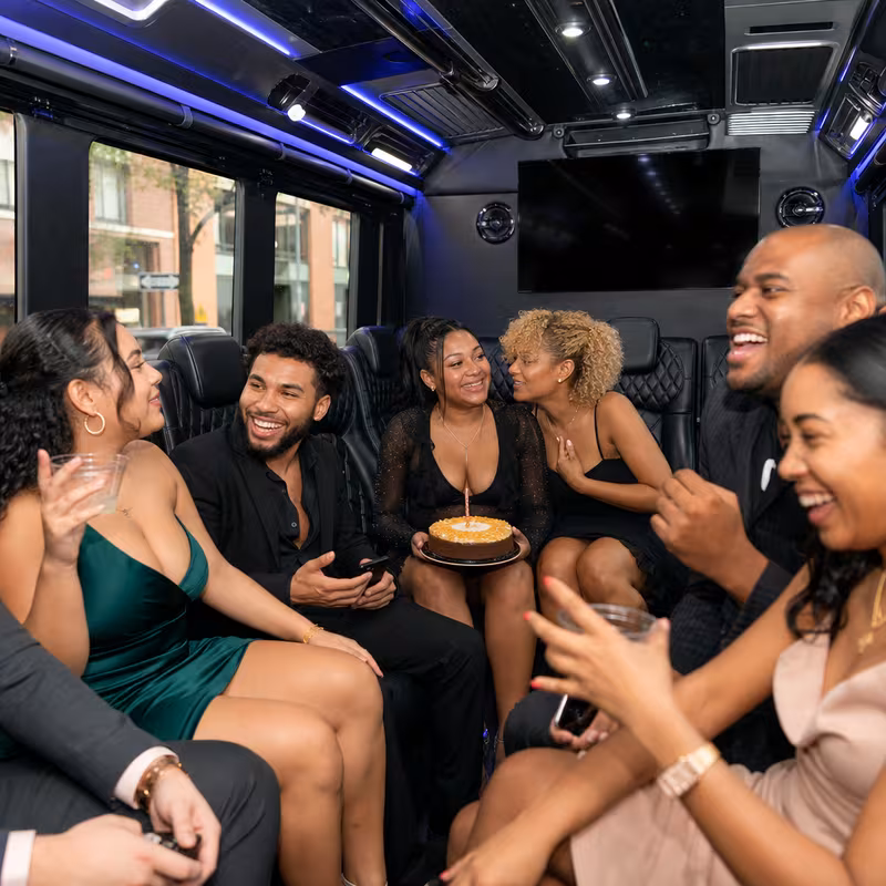 Black Mercedes Sprinter van staged for an Peoria Birthday Transportation group