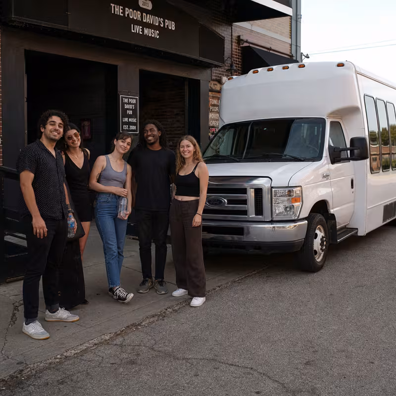 Black Mercedes Sprinter van staged for an Peoria Concert Transportation group